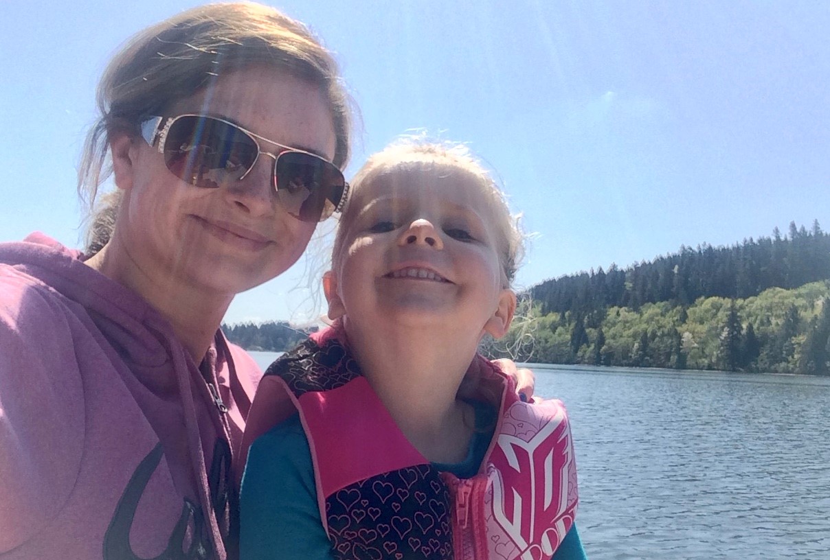 Steph and her daughter on the river